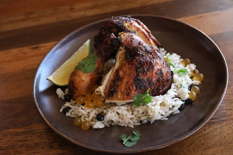 Jerk chicken on cilantro lime rice